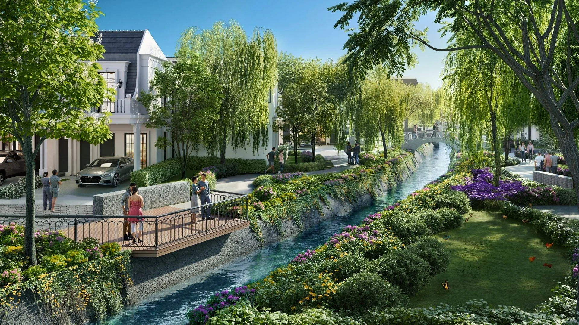 Sungai buatan dengan pohon willow dan taman di tepinya